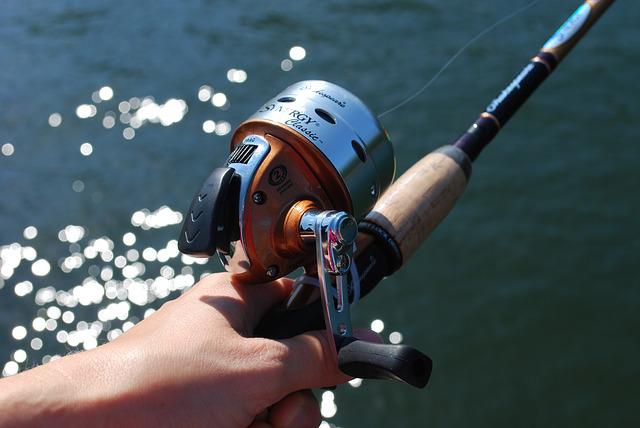 Man using a fishing pole.